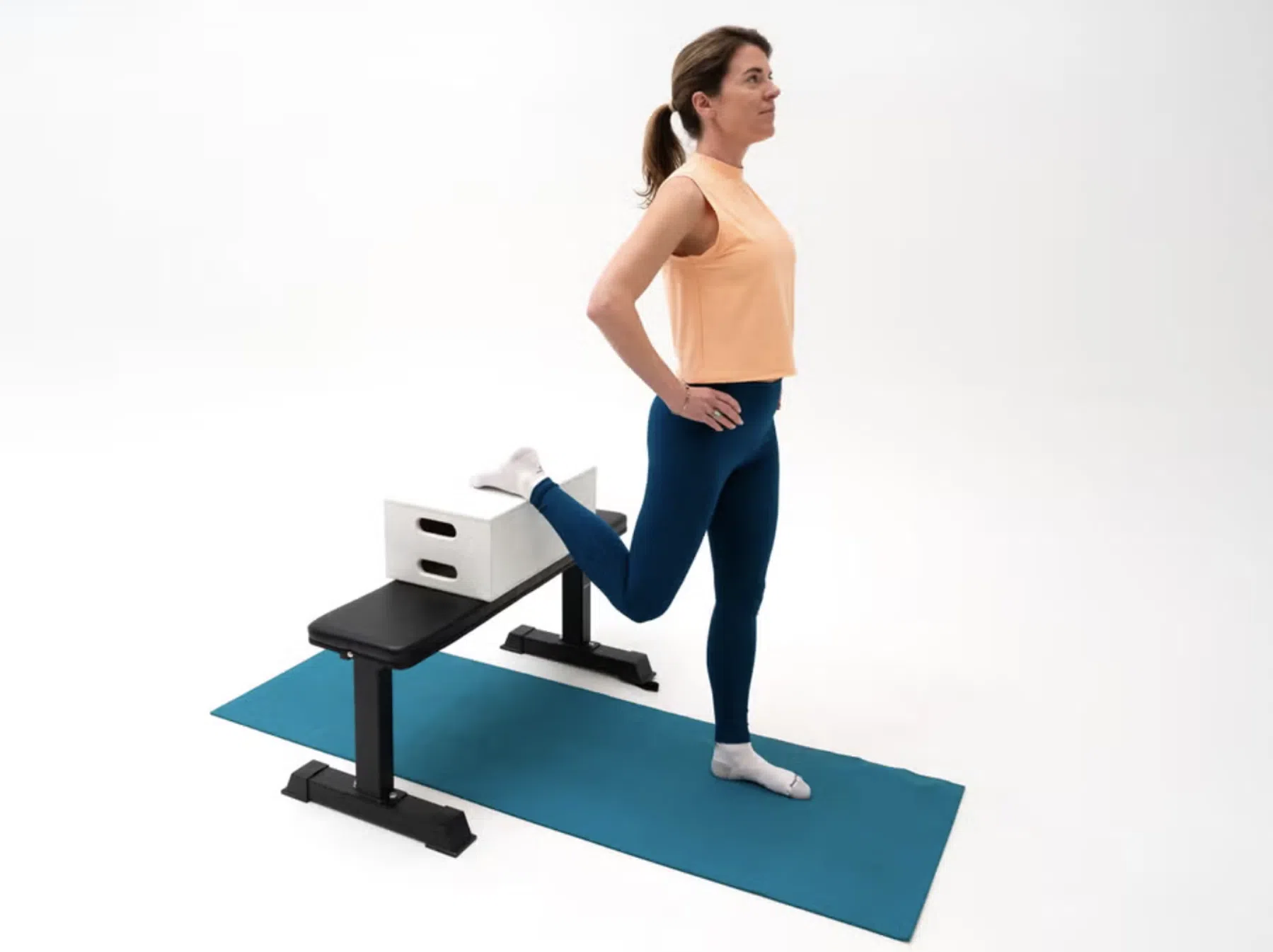 Standing Quad Stretch With Rotation